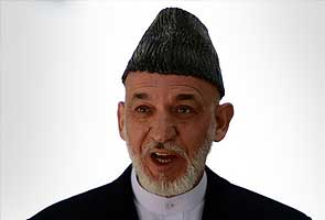 Afghanistan President Hamid Karzai arrives in Pakistan on day-long visit