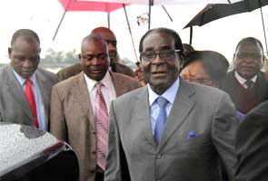Zimbabwe's Robert Mugabe wins poll landslide, opposition cries foul