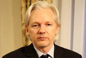 Julian Assange dons wig, channels John Farnham in Australian polls spoof