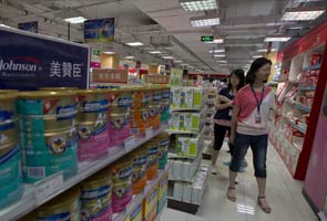 China fines three milk suppliers in price-fixing probe 