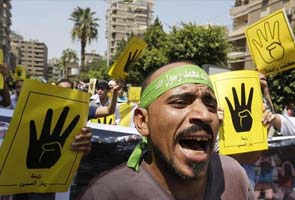 In Egypt, thousands of Mohamed Morsi supporters march amid heavy security