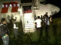 Plane skids off runway after hitting cow