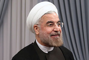 Iran's new president Hassan Rowhani takes oath on vowing to rescue economy