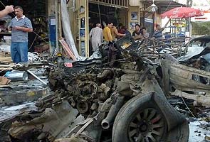 Bombs target Iraqi shoppers, killing more than 50