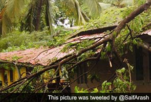 In rain-lashed Kerala, landslides, over-turned cars; Kochi airport closed