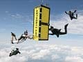 Locked in a box, daredevil thrown from 14,500 feet in air stunt