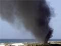 Military plane bursts into flames at Mogadishu airport