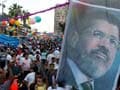 Mohamed Morsi's supporters stage Eid protests in Egypt as military holds off