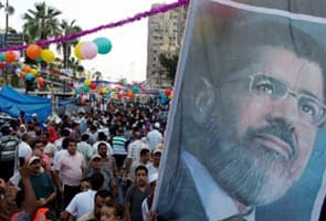 Mohamed Morsi supporters defiant as Egypt crackdown looms