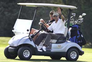 On his Martha's Vineyard vacation, Barack Obama seeks favour from the golf gods