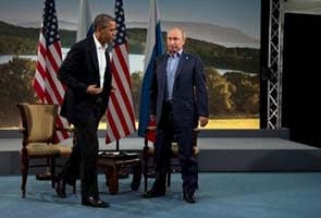 In wishing George Bush well, Vladimir Putin has message for Barack Obama