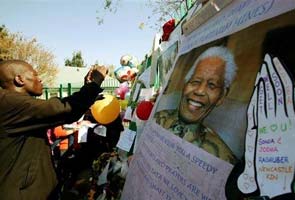 Critically ill Nelson Mandela 'more alert' every day: daughter