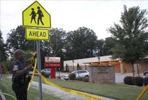Brave clerk talked man out of US school shooting bloodbath