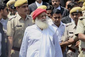 Asaram's men threatening girl's family says lawyer, godman's custody extended