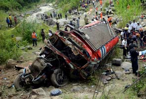 Guatemalan bus plunges off cliff, killing at least 43