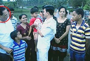 Super-mantri! Minister helps rescue family trapped in water Super-mantri! Minister helps rescue family trapped in water
