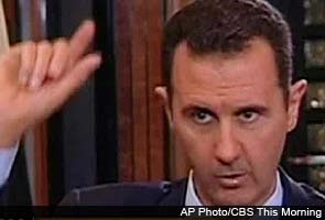 Bashar Assad warns of retaliation for US strike on Syria