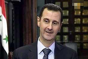 Syrian President Bashar al-Assad behind 'massive, coordinated' chemical attack, claims French intelligence