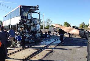 At least five killed as train and bus collide in Canada