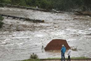 Three dead, thousands evacuated in Colorado flooding