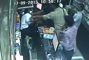 Assault on chemist caught on CCTV: Security officers among five arrested
