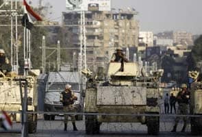 Egypt's Brotherhood under legal threat as bomb hits central Cairo