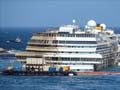 Costa Concordia hauled upright off Italy coast
