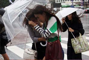 Typhoon hits Japan as Fukushima operator releases water into sea