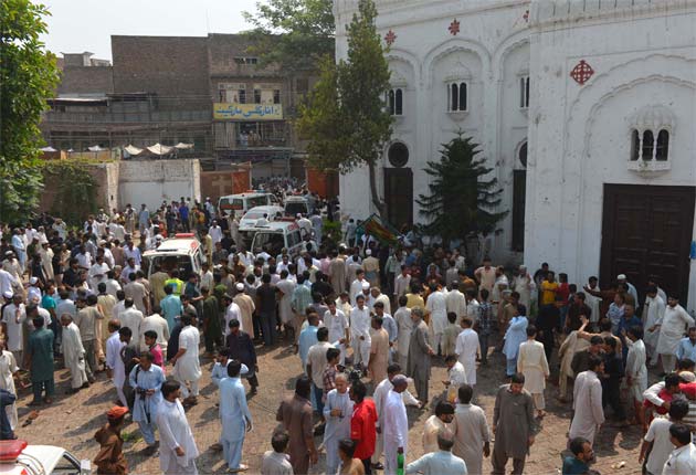 Suicide bombers kill more than 60 at Pakistan church