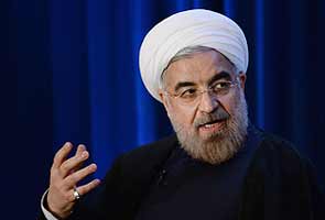 Iran president pledges nuclear plan, sincerity