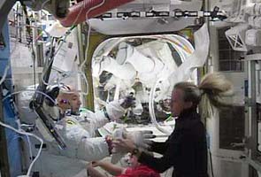 Three space station crewmembers heading home after 166 days