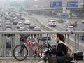 Factory shutdowns, traffic limits as China moves to tame its smog