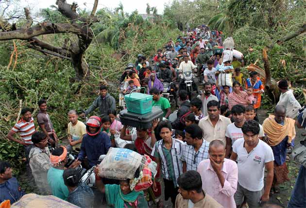 Cyclone Phailin kills 23, mass evacuations save thousands