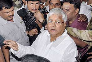Lalu Prasad jailed for five years in fodder scam, is no longer an MP