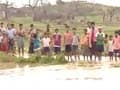 Seven kilometres of flood water separates these Odisha villages from road