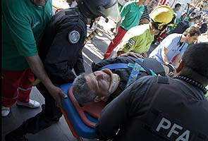 Argentine commuter train slams into station, 80 hurt