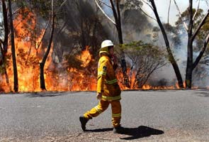 Australia merges two blazes to battle out wildfire