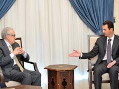 Syrians will decide on Geneva peace talks, Assad tells envoy