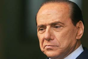 Silvio Berlusconi defeated, decides to back Italy government 