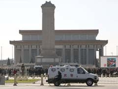 Chinese police seek eight following Tiananmen attack