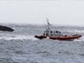 Italy coast guard: many survive migrant capsizing