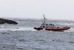 Italy coast guard: many survive migrant capsizing