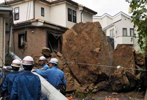 Four killed as typhoon sideswipes Tokyo, moves up Japan coast