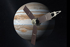 NASA spacecraft zips by Earth en route to Jupiter 