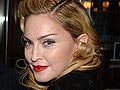 Madonna banned from theater chain after texting during movie