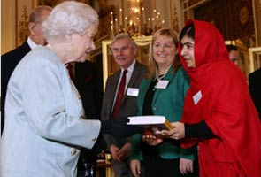 Malala Yousafzai meets Queen Elizabeth, attends reception at Buckingham Palace