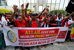 Malaysian court rules use of 'Allah' exclusive to Muslims