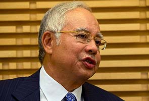Malaysian PM Najib Razak strengthens hand in party polls