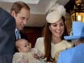 Chubby Prince George shown off at royal christening