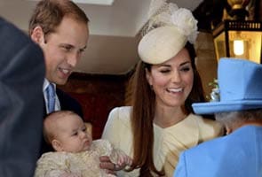 Chubby Prince George shown off at royal christening